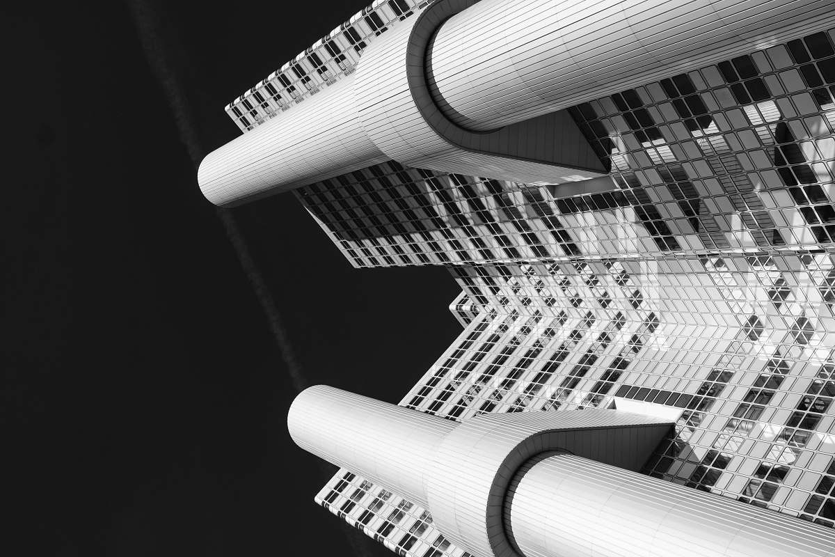 building low-angle photography of white and black concrete building architecture