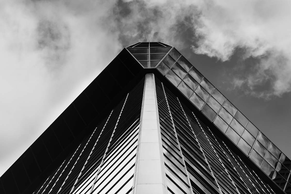 building low angled photography of mirror building office building