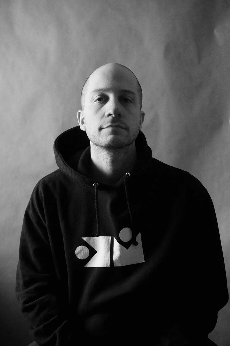apparel man in black pullover hoodie clothing