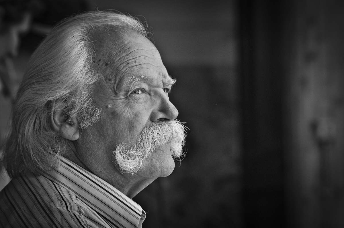 human man in collared shirt grayscale photo face