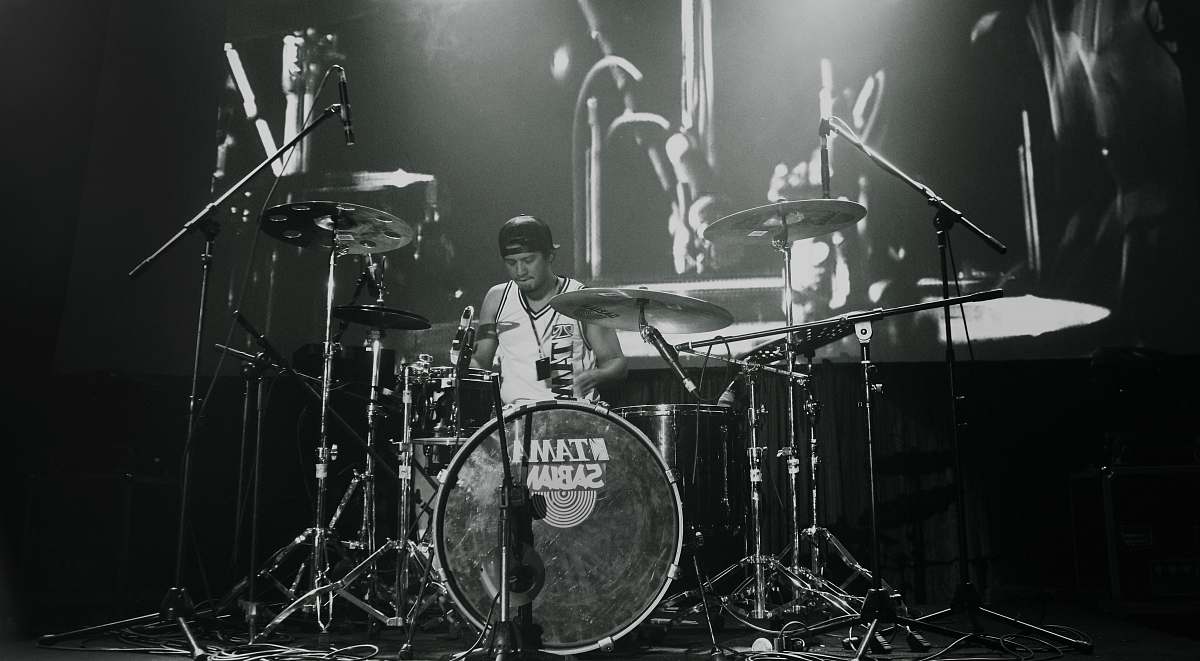 musician man playing drum set drummer