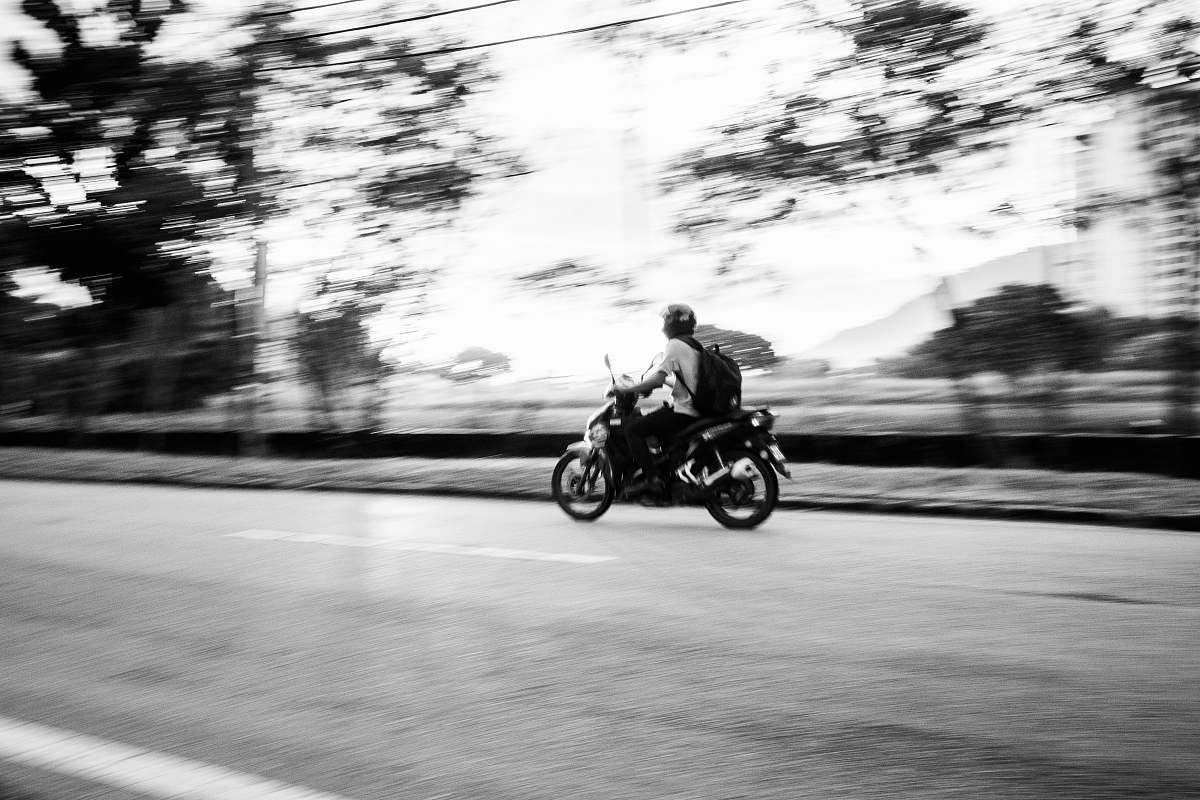 motorcycle man riding motorcycle transportation