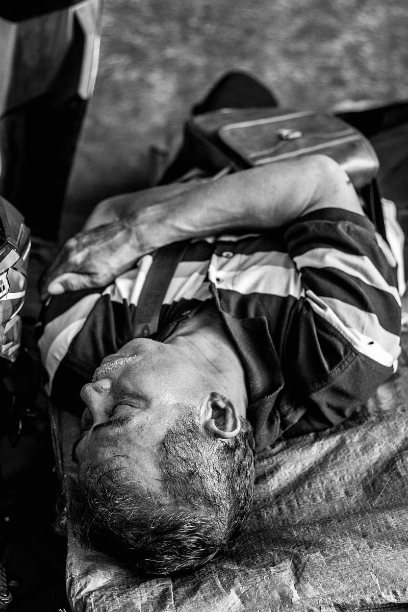 human man sleeping on sack face