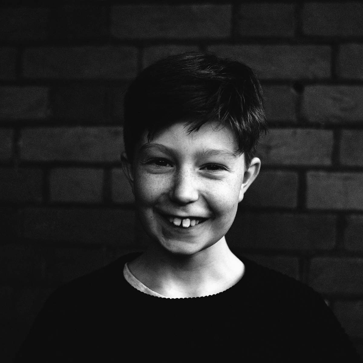 person man smiling at camera people