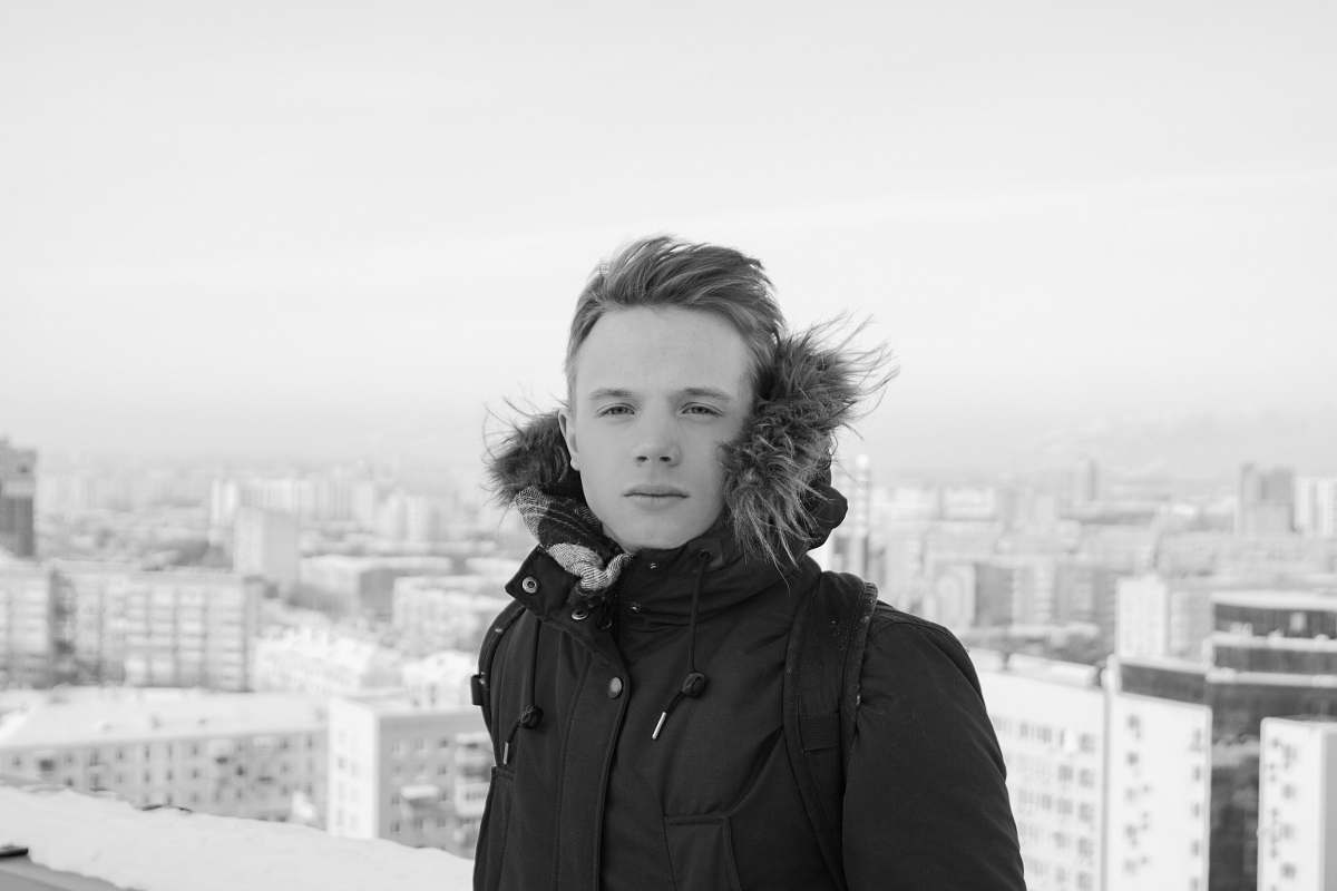 apparel man wearing black zip-up parka coat clothing