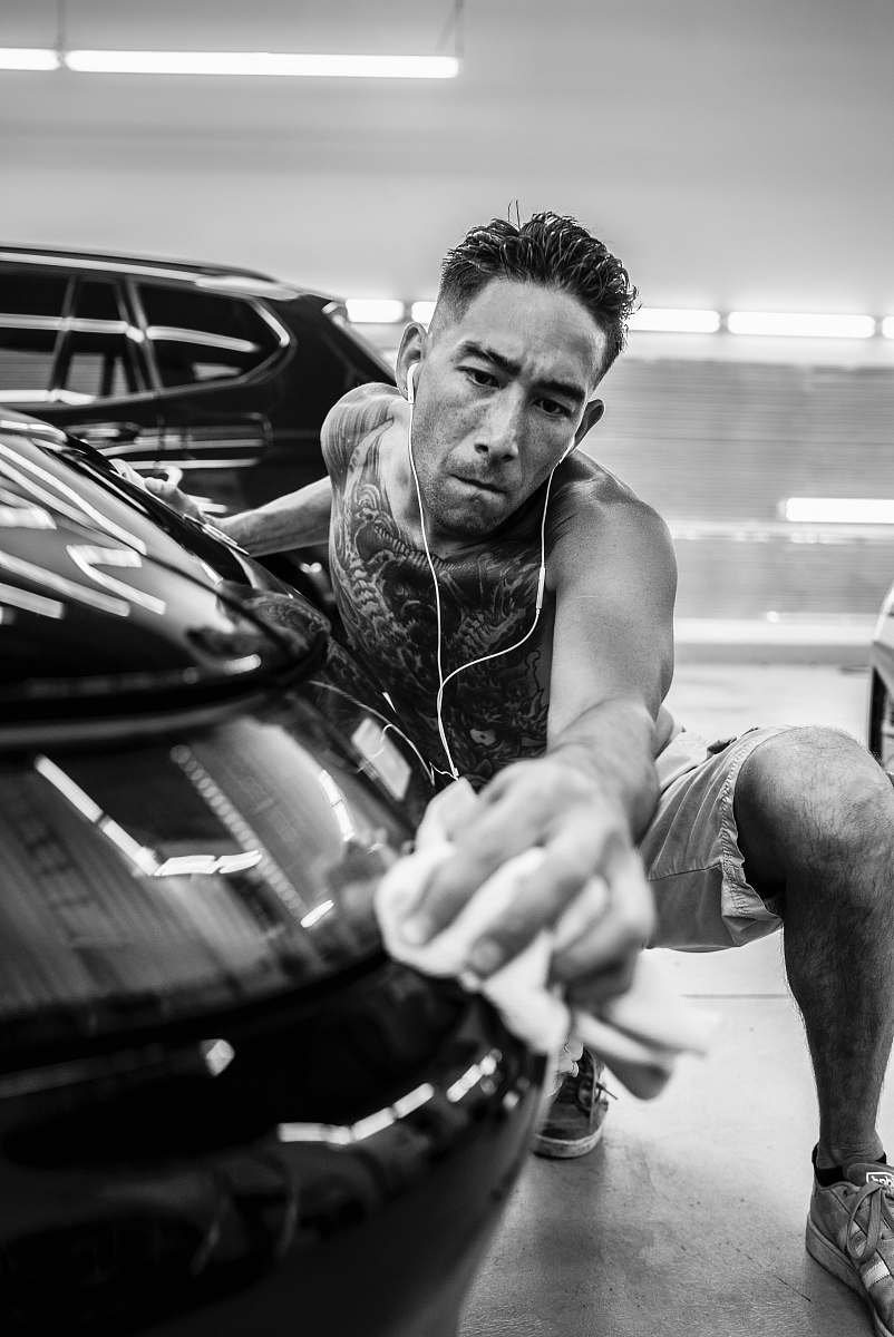 apparel man wiping vehicle clothing