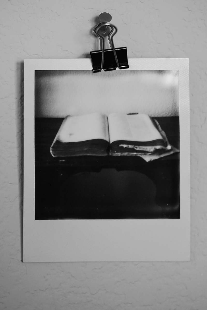 black open book photo text