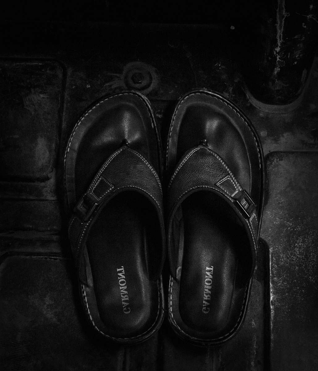 apparel pair of black leather sandals clothing