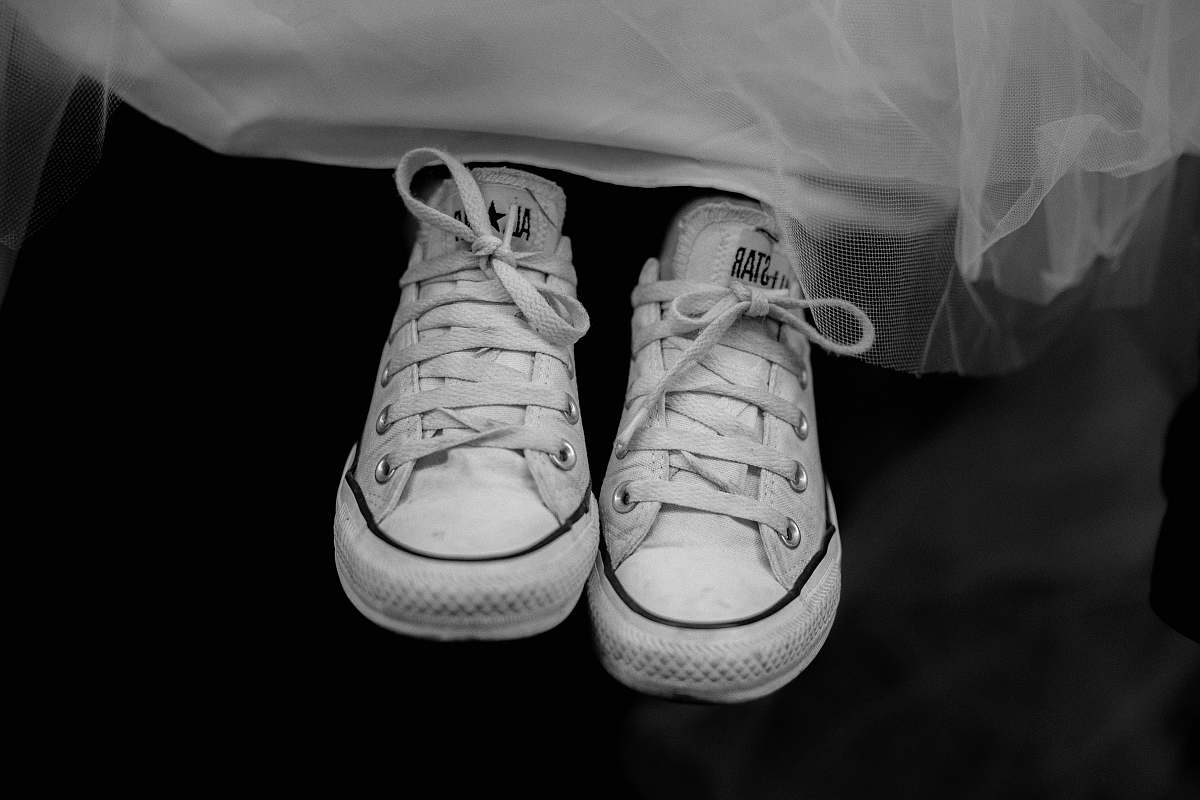 apparel pair of white low-top shoes clothing