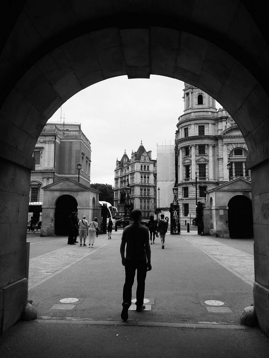 human person near building pedestrian