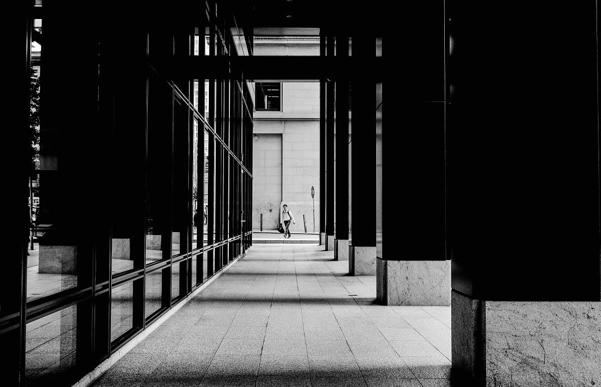 architecture person standing on hallway building