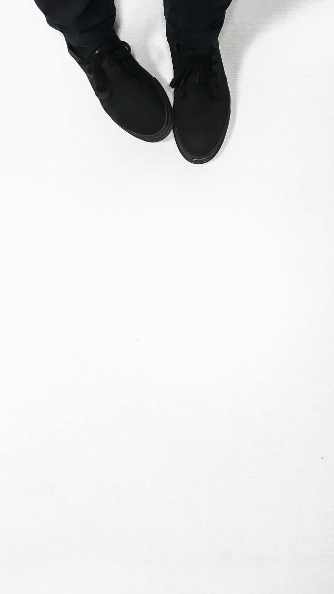 person person wearing black shoes human