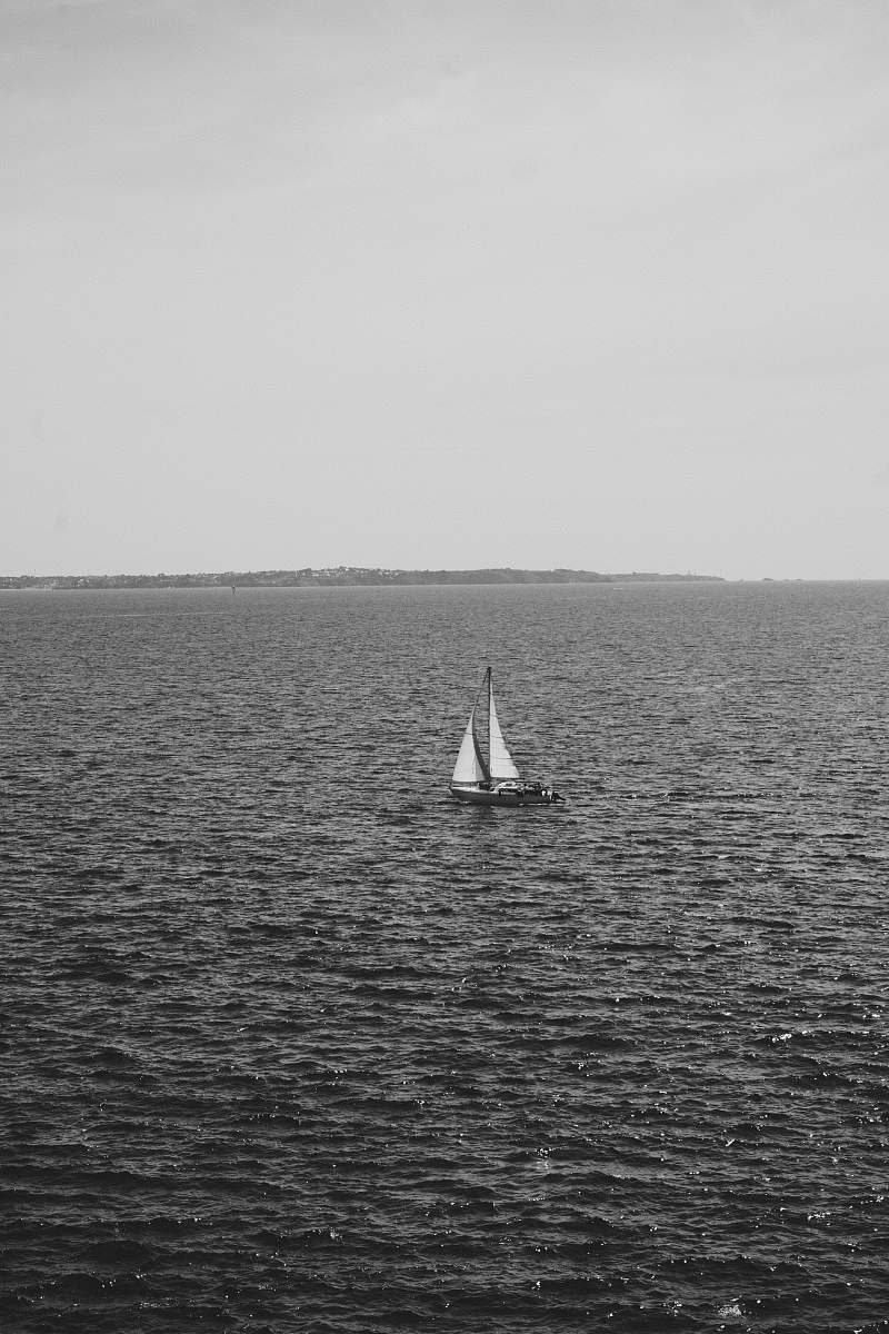 grey sailboat in sea transportation