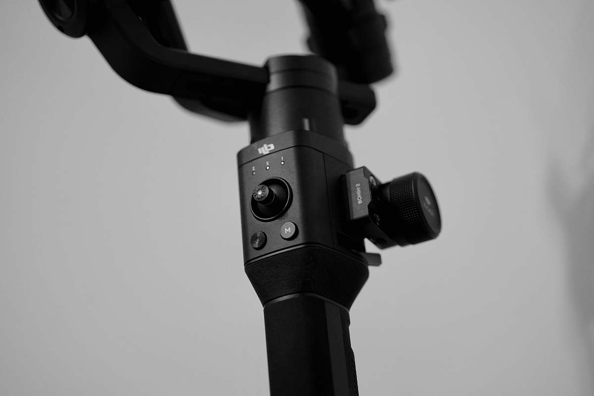 camera selective focus photography of monopod electronics