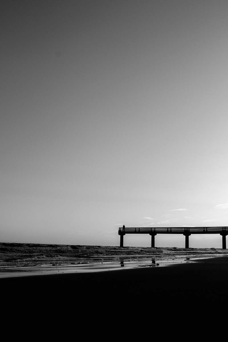 water silhouette of bridge pier