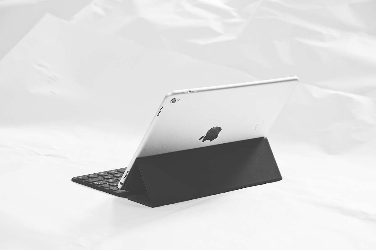 grey silver iPad on smart case ipad