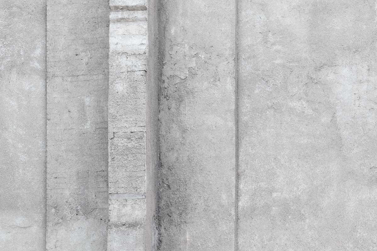 grey top view photo of gray concrete road curb wall