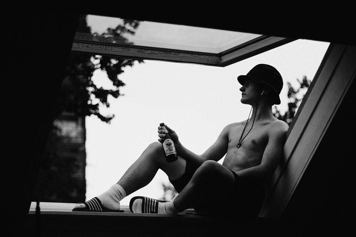 human topless man holding bottle person
