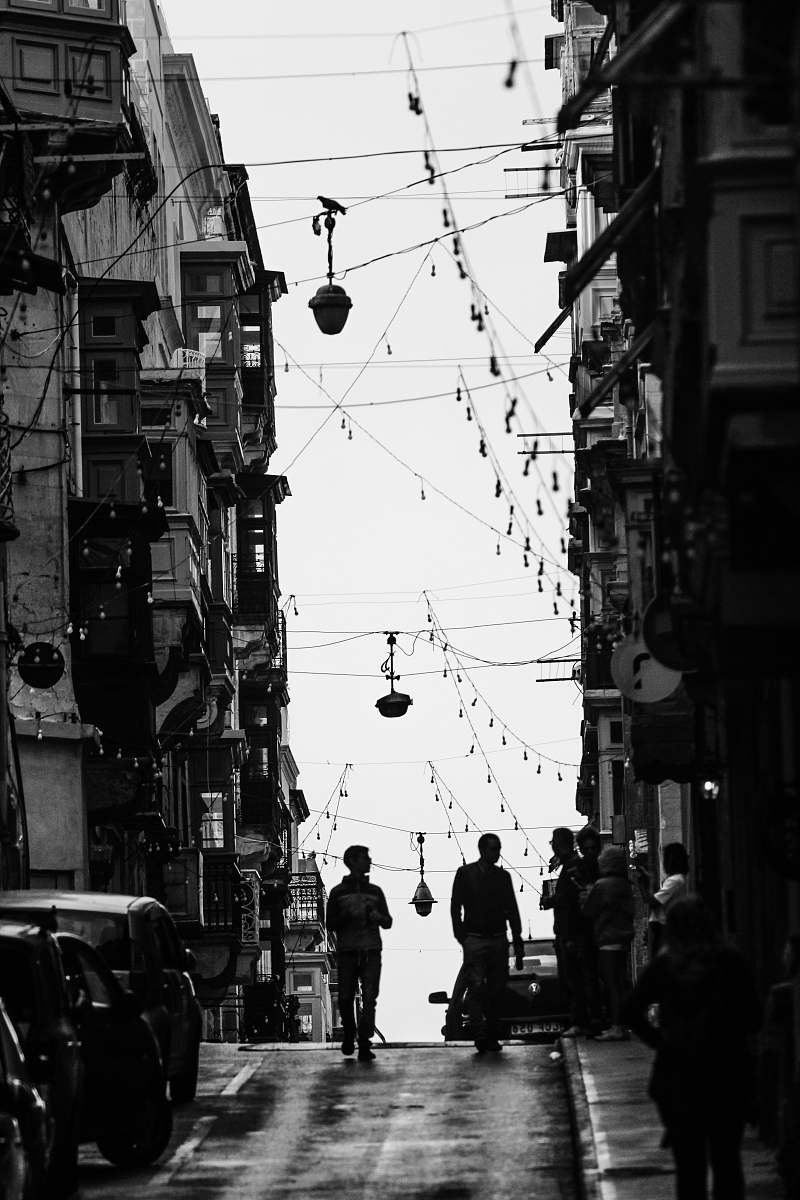 people two men walking on street during daytime human