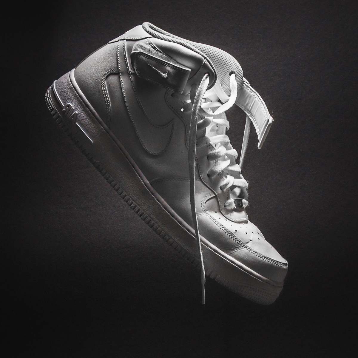 clothing unpaired white Nike low-top shoe apparel