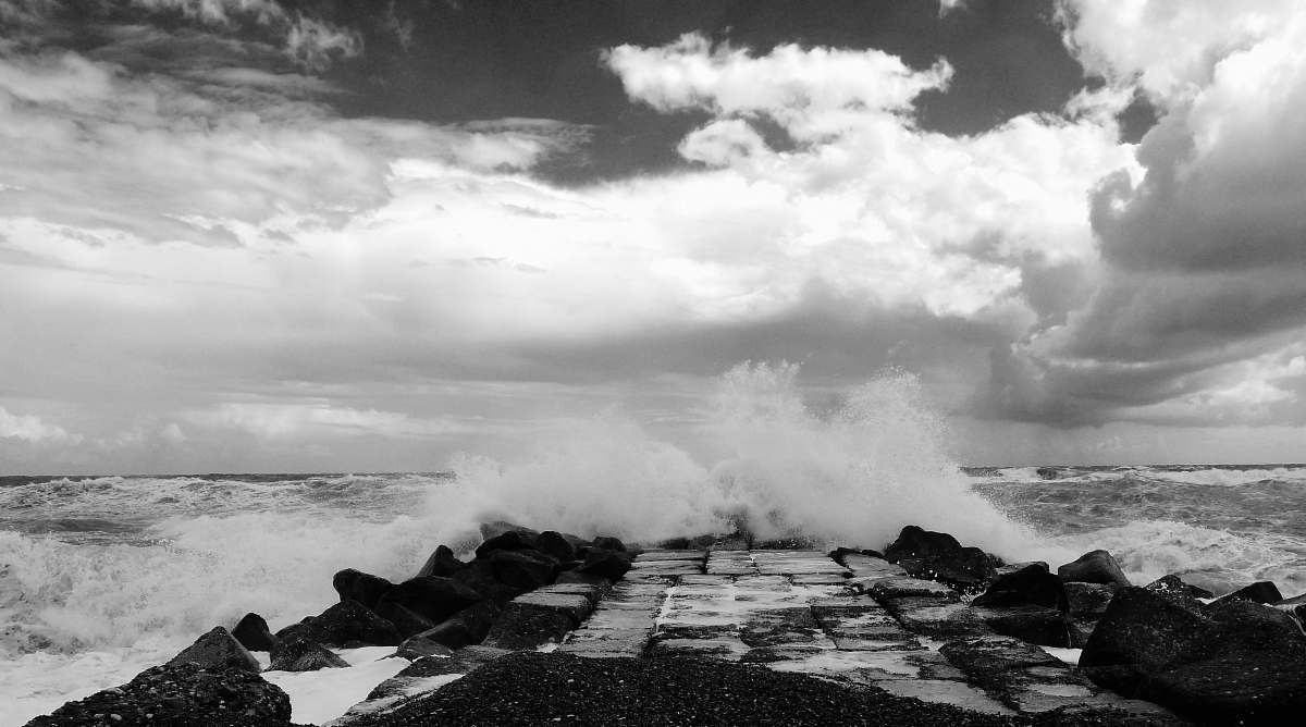 nature view of dock with splash of water outdoors