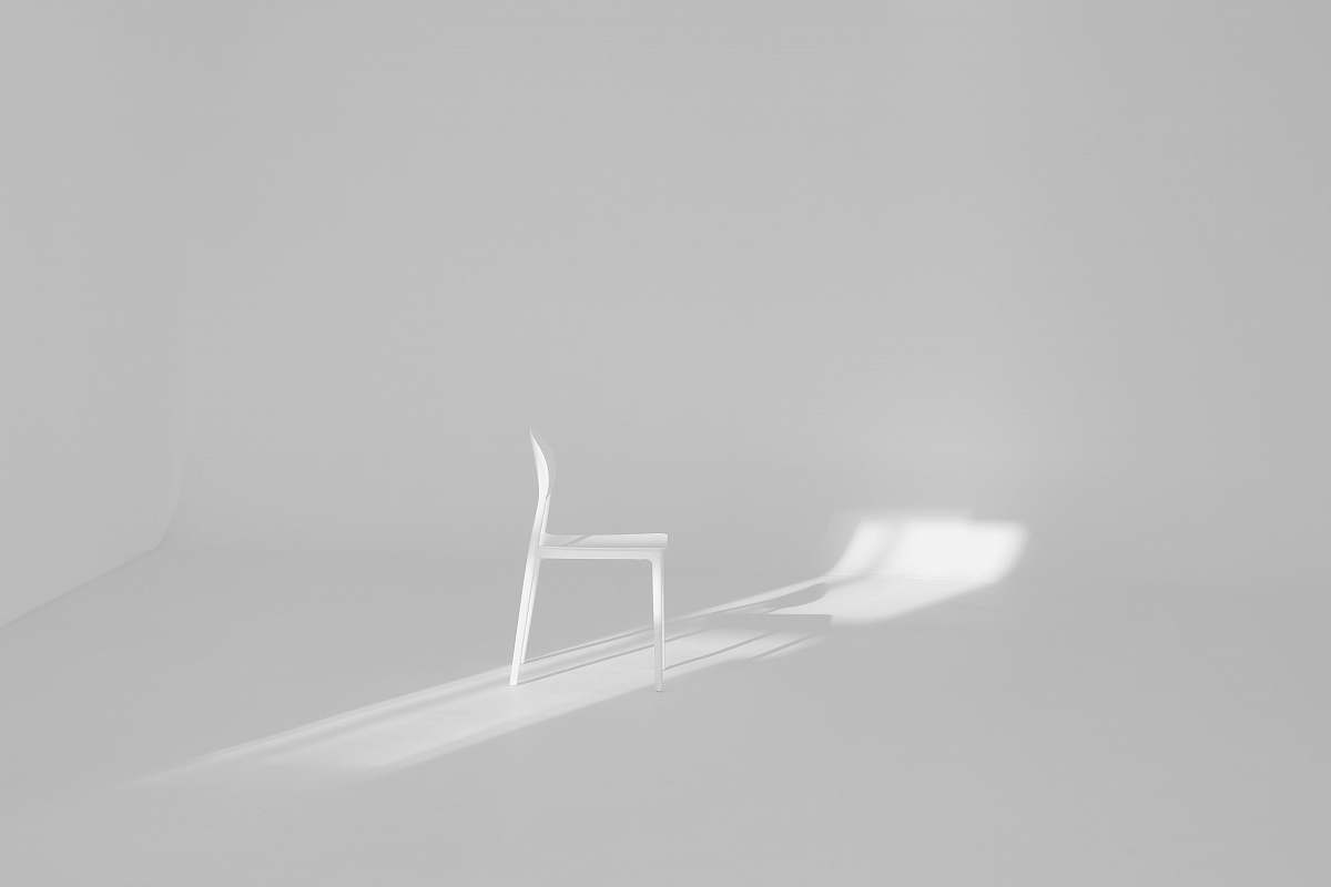 chair white chair on white surface furniture