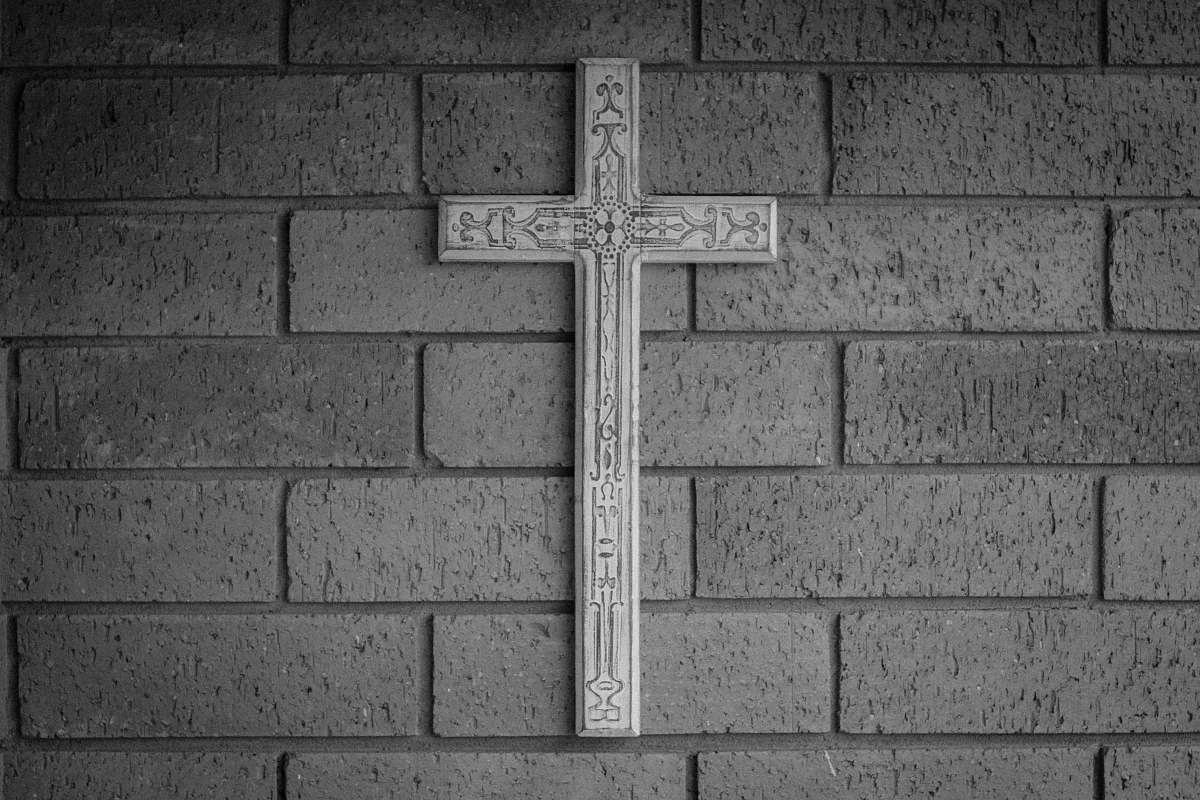 grey white cross hang on wall cross