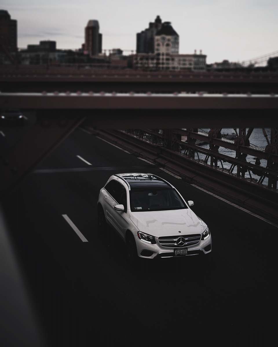 car white Mercedes-Benz SUV on road automobile