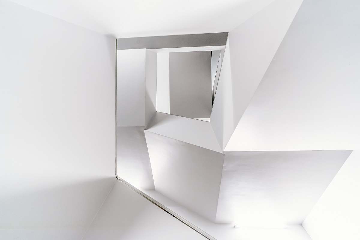 grey white wall mirror corridor