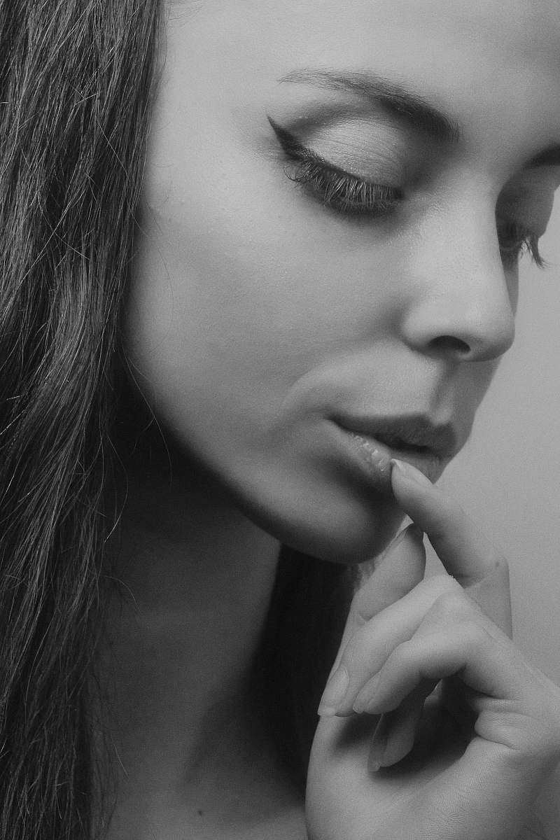 face woman holding her lower lip human