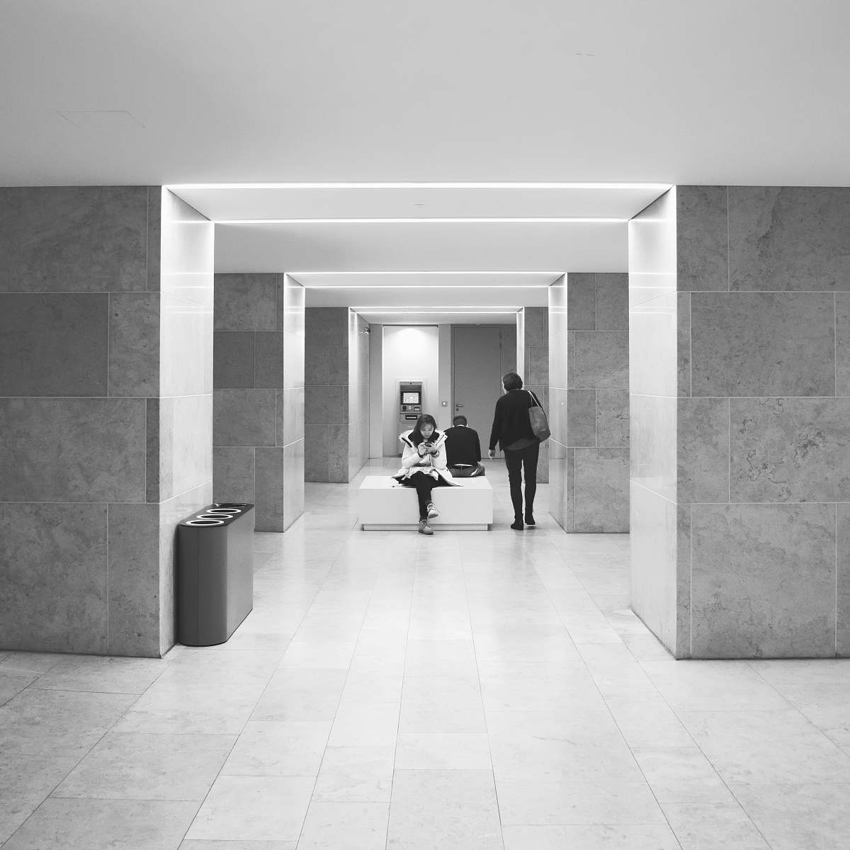 floor woman sitting on bench corridor