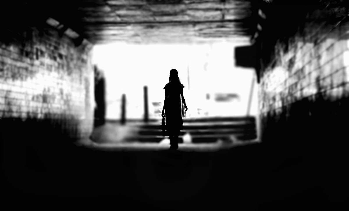 person woman walking undergorund mumbai