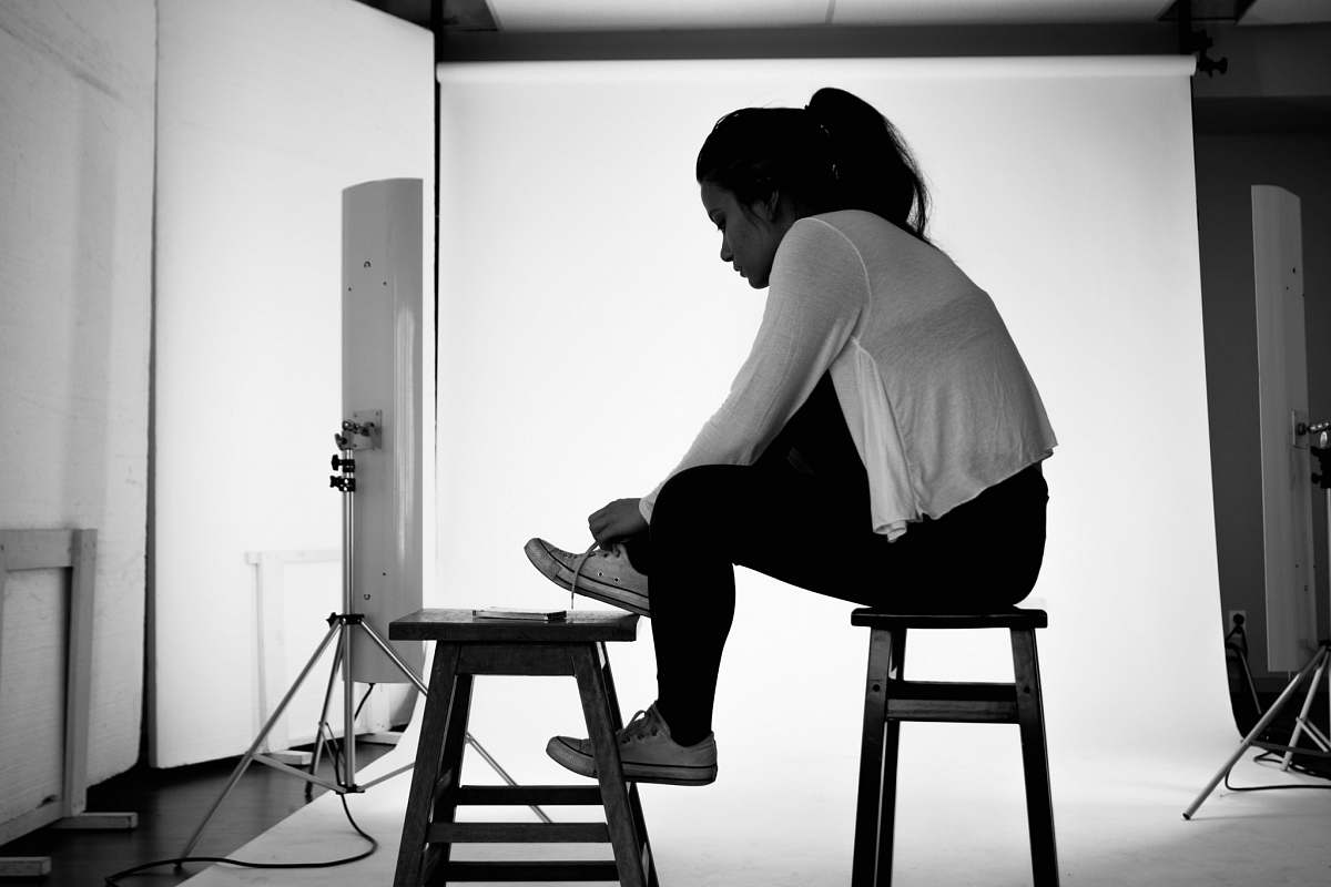 furniture women wearing cardigan grey-scale photography bar stool