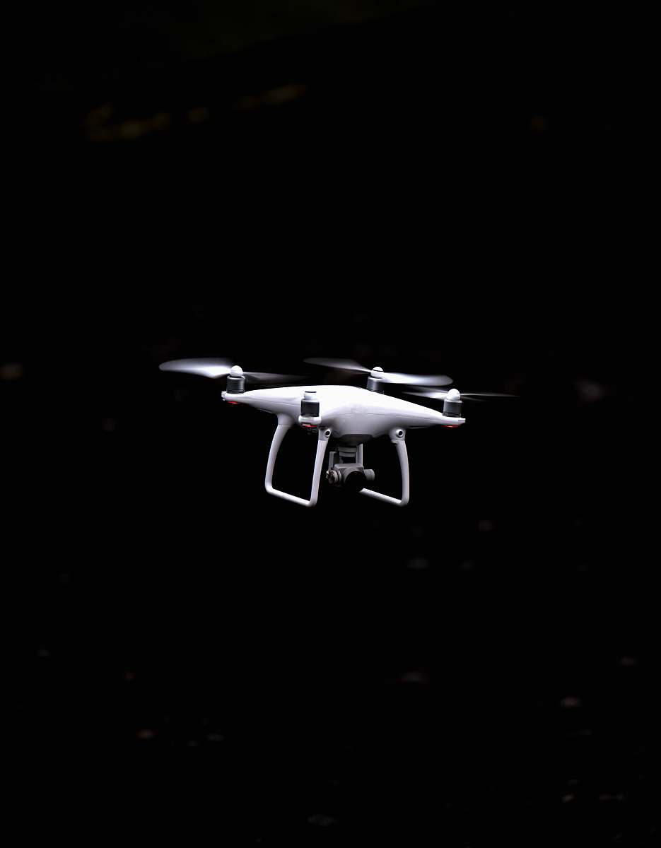 drone white and black quadcopter drone white