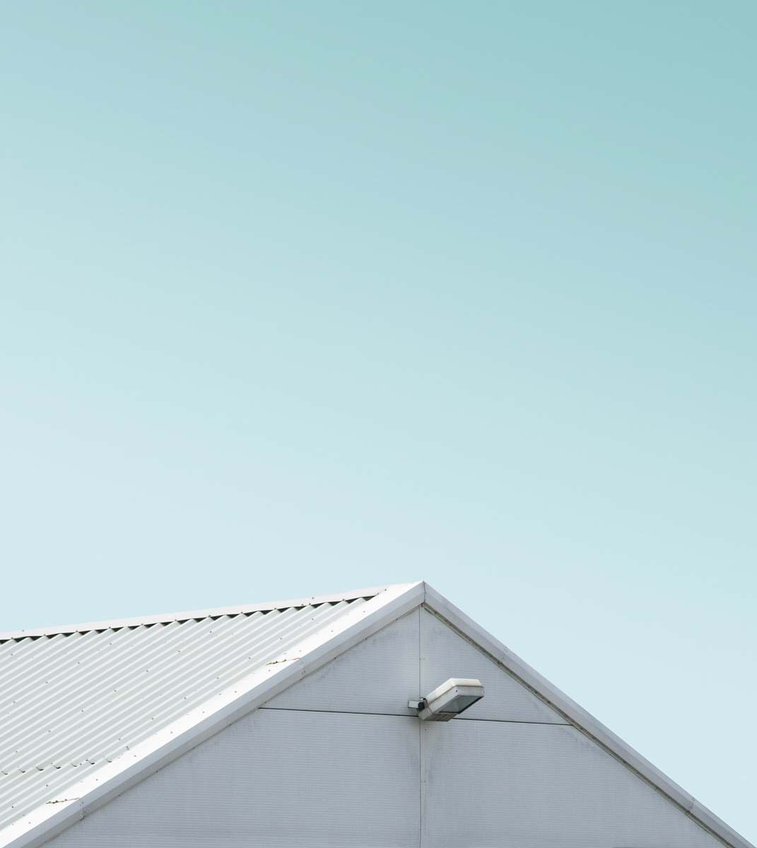 triangle close view of white painted shed slough