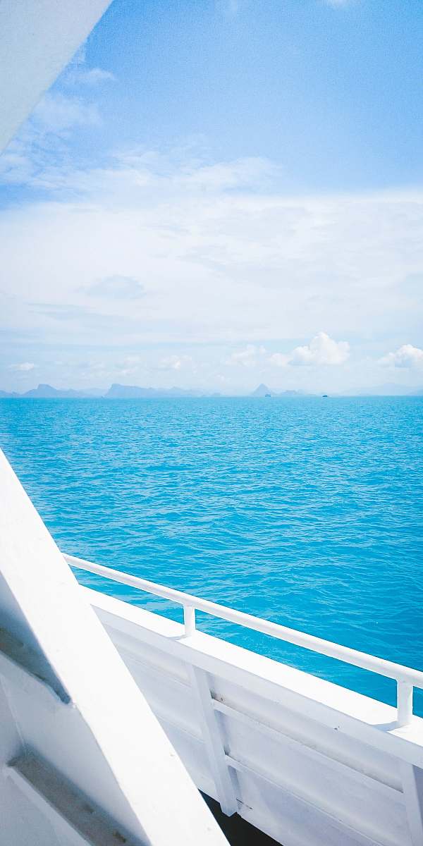 sea white boat voyaging on ocean during daytime gulf of thailand