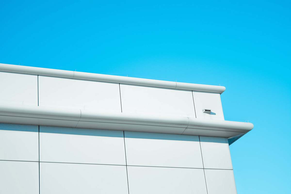 building white concrete building during daytime minimalism