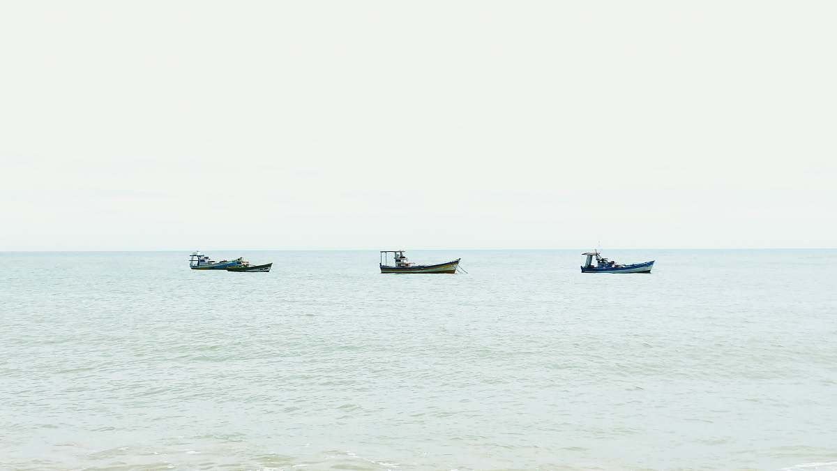 transportation three boats on body of water during daytime vehicle