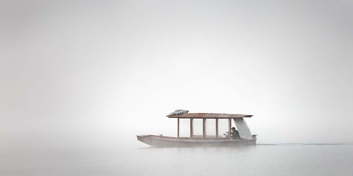 vehicle white and brown boat on body of water transportation