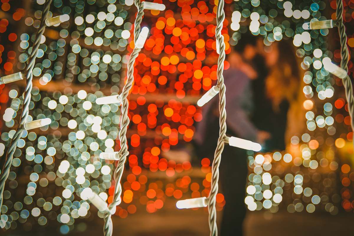 white bokeh photography of string lights silver