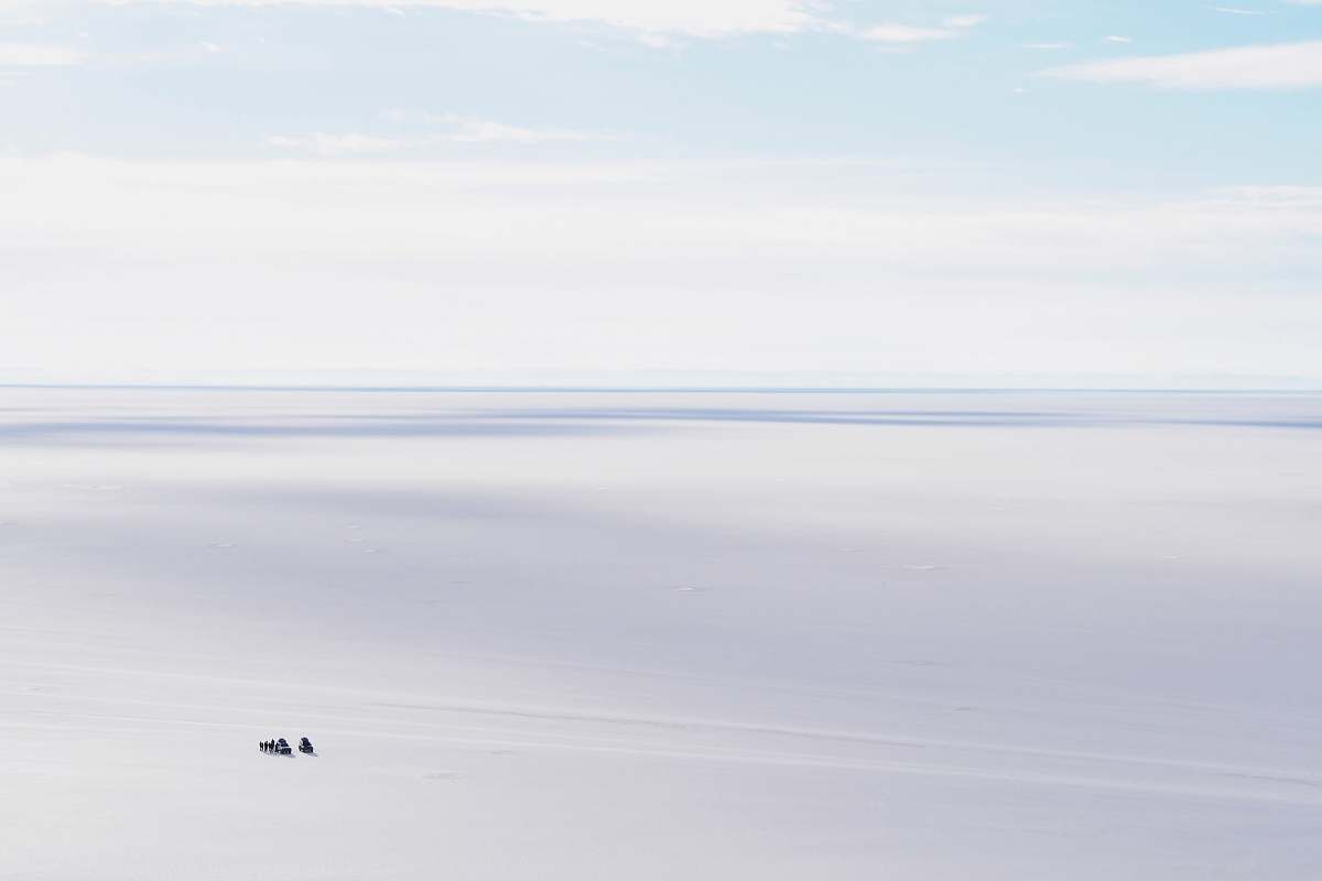 horizon body of water under blue sky sky