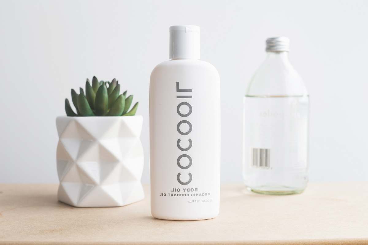 lotion Cocooil baby oil on desk shampoo