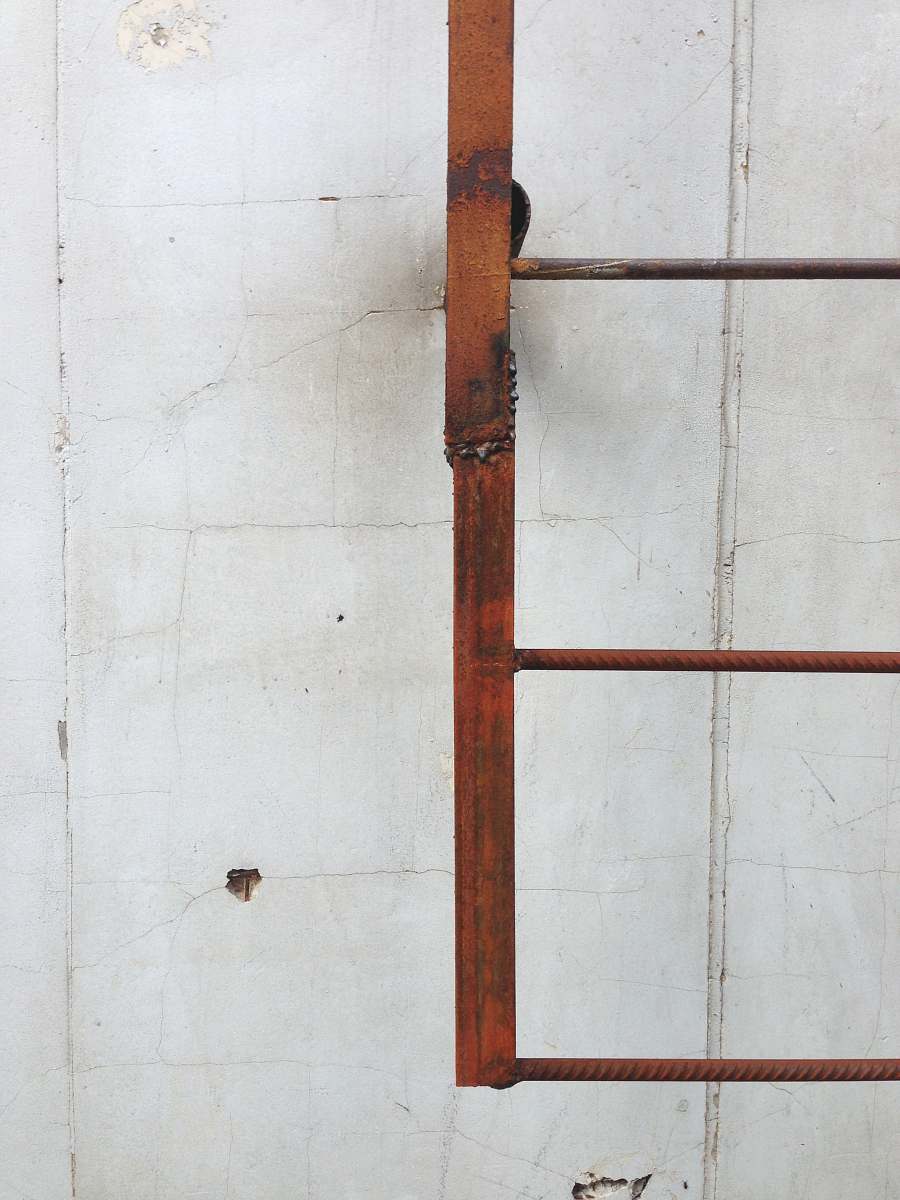 stair brown metal ladder on wall ladder