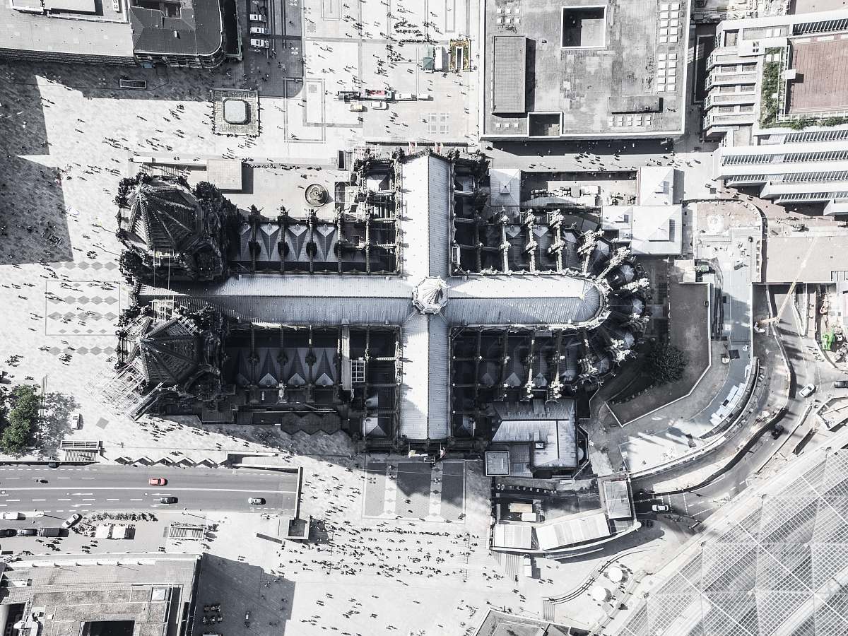 city aerial photography of cross-shaped building cologne