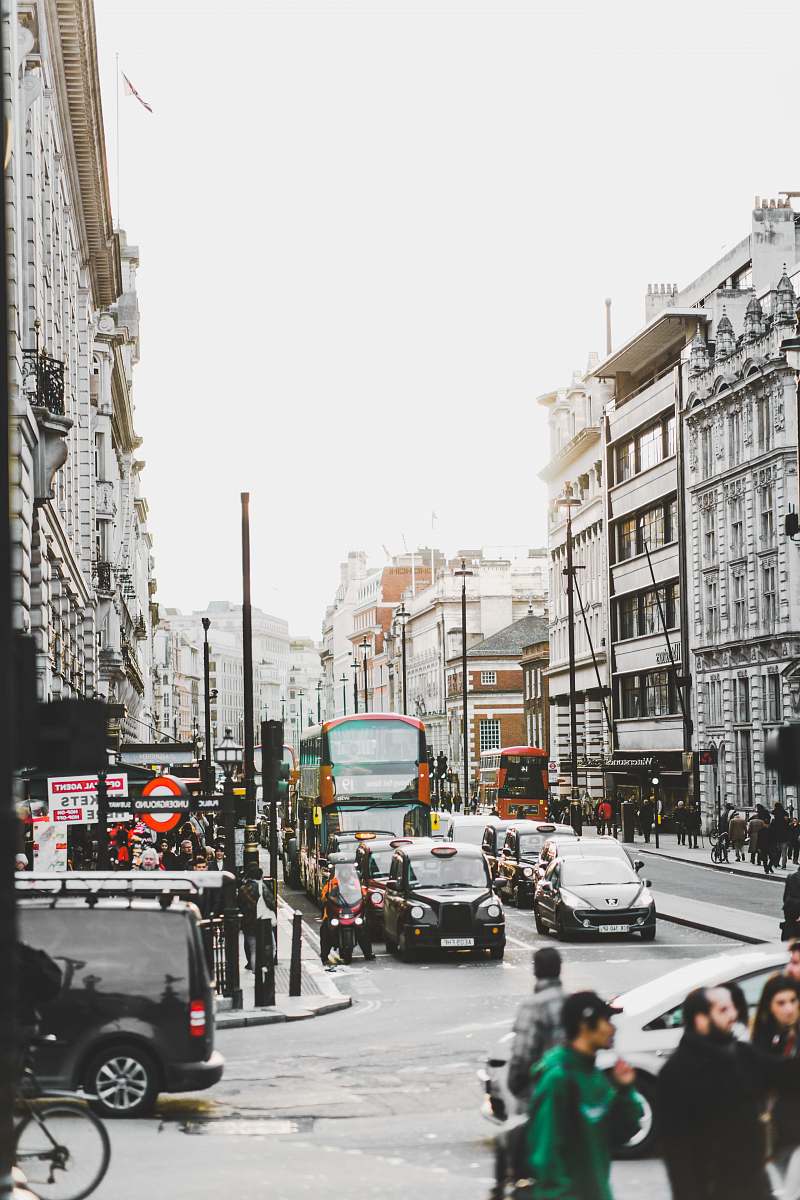 london assorted cars traveling on black road street