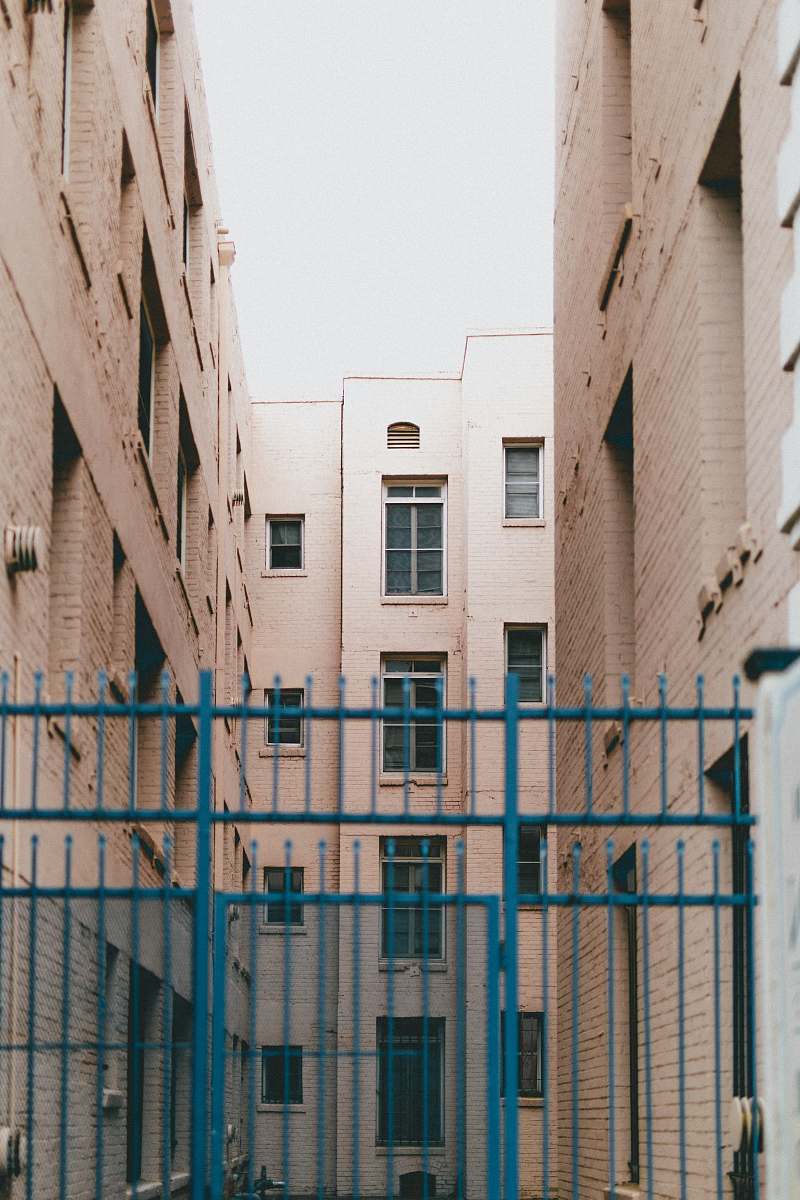 city beige high-rise buildings urban