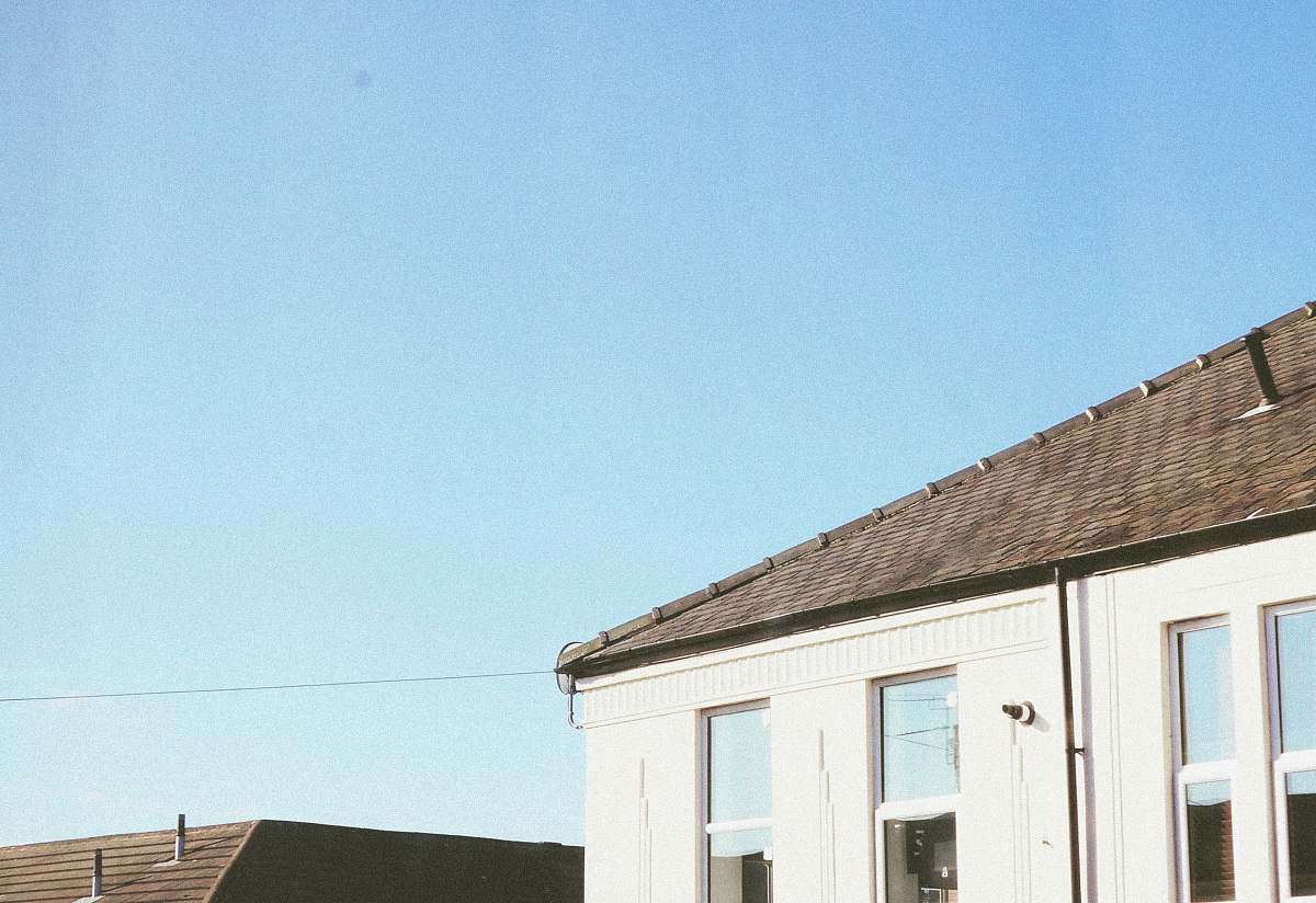 blue brown and white building during daytime window