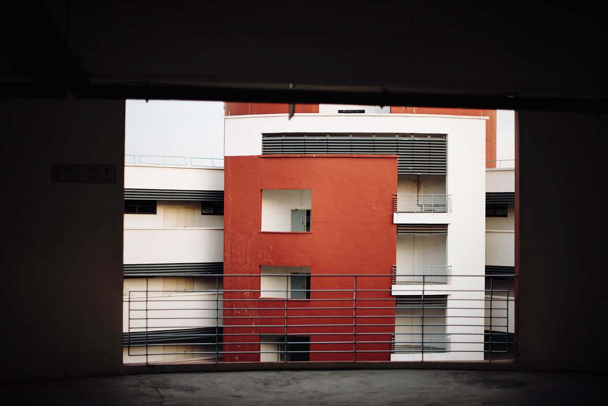 frame brown and white high-rise building facade