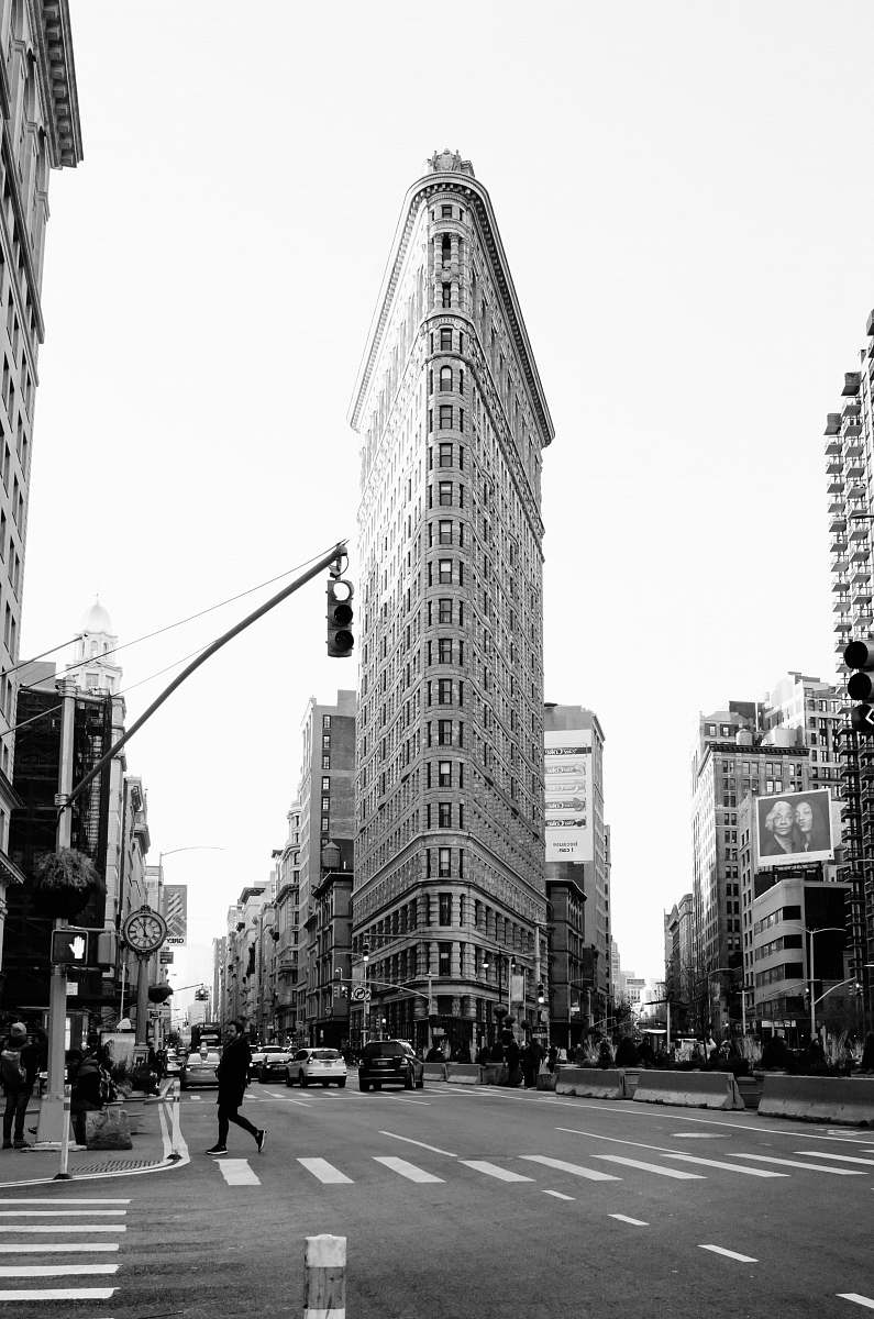 black-and-white Flatiron Building person