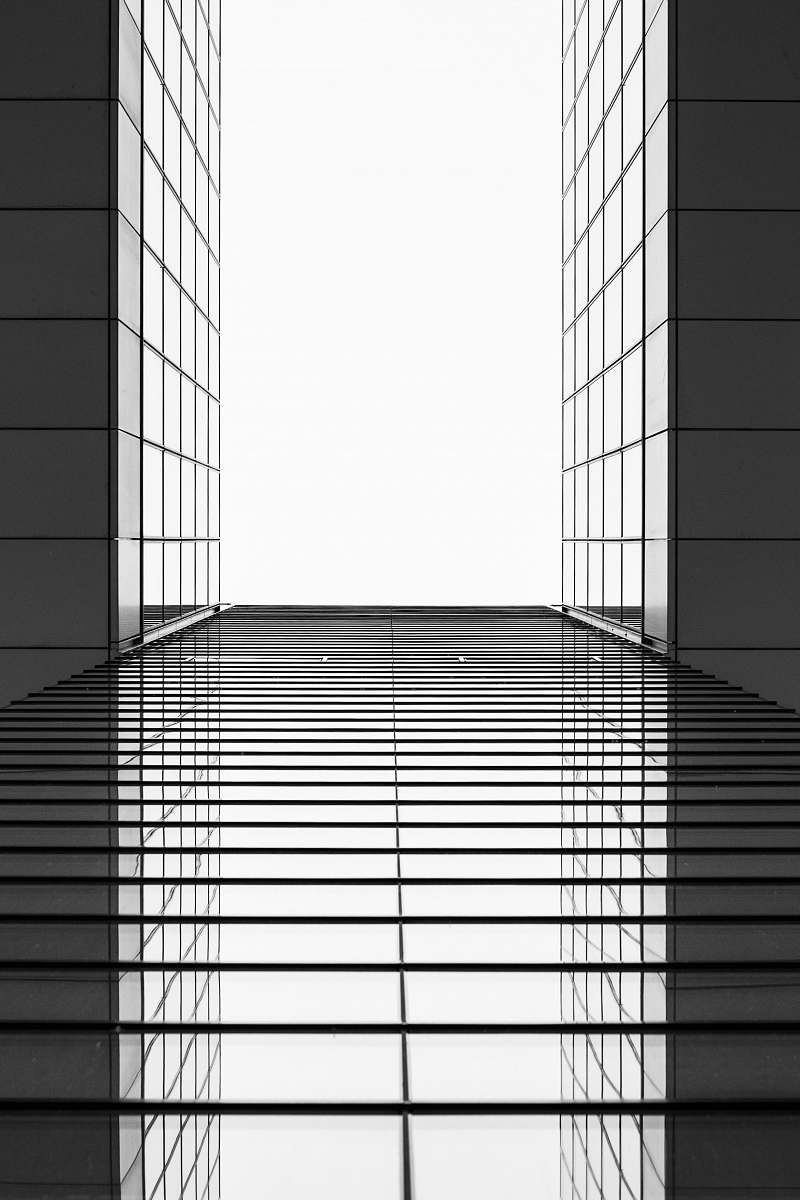 architecture gray and black building mirror black-and-white